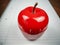 Closeup of kitchen timer in apple shape as a pomodoro study technique for schools for timing study sessions and increasing