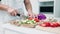 Closeup, knife and man with vegetables, cooking and kitchen counter with meal prep, wellness and nutrition. Person, home