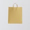 Closeup Kraft Paper Bag Isolated Center White Empty Background.Mockup Highly Detailed Texture Materials.Space for