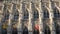 Closeup of lace-like sculptural details and statues on facade of gothic Leuven Town Hall building. Famous Belgian