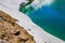 Closeup of the lake Lac Lioson surrounded by snow in Switzerland