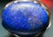 Closeup of Lapis Lazuli stone making a blue abstract background