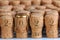 Closeup of a large group of Champagne corks, that fill the frame. Stamped with the date 2022