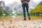 Closeup leg shot of woman hiker on the shores of Lake Bries