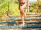 Closeup legs and lower body in swimwear of healthy fit beautiful girl