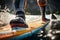 Closeup of legs Stand up paddle boarding on the waters