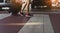 Closeup legs of woman walking step on street at airport