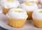 Closeup of Lemon Cupcakes with White Icing