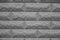Closeup of light grey brickwork texture