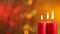 Closeup of lighting three christmas candles