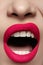 Closeup of lips makeup. Beautiful fashion bright pink lip mat make-up