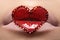 Closeup lips with red heart make-up & rhinestones. Valentines Day style