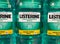 Closeup of listerine mouthwash bottles in shelf of german supermarket