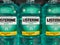 Closeup of listerine mouthwash bottles in shelf of german supermarket