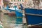 Closeup of little fishing boats at the port of Camogli