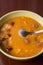 Closeup macro angle of cooked beans with sausages served in the bowl