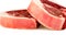 Closeup macro background texture of red meat lamb loin chops