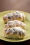 Closeup macro baked rolls with coconut served on the plate