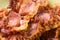 Closeup macro of crisp fried bacon on the plate