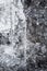 Closeup macro of melting icicles on rocks