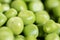 Closeup macro pile of fresh green peas ready for cleaning