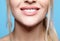 Closeup macro portrait of female red smiling lips with day beauty makeup