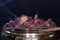 Closeup macro shot of dry petals on top of a heating bowl - concept of meditation