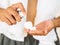 Closeup of male hand pumping a shaving foam.