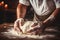 closeup male hands kneading the dough