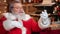 Closeup male Santa Claus talking distance video call use smartphone. Shot with RED camera in 4K