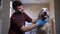 Closeup male veterinarian stroking dog at clinic