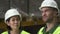 closeup male and woman colleagues in uniform discuss working process. warehouse