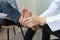 Closeup of Man feeling pain in her foot and doctor the traumatologist examines or treatment on white background, Healthy concept