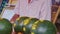 Closeup Man Gives Change to Customer at Watermelon