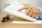 Closeup of man hand reading a book