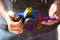 Closeup Of Man hand Using Colorful dslr camera, Creativity