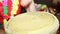 Closeup of man\'s hands drumming out a beat on an African skin-covered djembe hand drum.