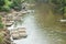 Closeup many wooden raft float at the side of canal background