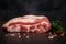 closeup marbled raw meat with ribs served with parsley