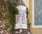 Closeup of memorial to left of Chapelle de la Visitation Sainte-Claire at the foot of Castle Hill in Nice, France