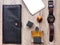 Closeup of men`s accessories and essential items on wooden background. Flat lay, top view, view from above