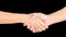 Closeup men\'s handshaking