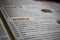 Closeup of menu card of german 24 hours pasta, noodle and pizza service restaurant