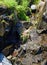 Closeup of a mini waterfall along the trailside