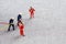 Closeup of miniature figurines dressed like members of firemen special team interfering during chemical accidents