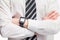Closeup mockup of crossed male hands with smart watch isolated