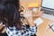 Closeup modern image smart brunette young woman from above working with laptop on table. Work stuff, graphic design