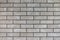 Closeup of modern neutral grey brick wall