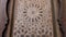 Closeup of a Moroccan, wooden door detail, with traditional wood carvings. Moroccan Islamic, Moorish architecture design.