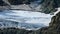 Closeup mountain glacier among a rocks